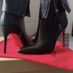 Christian Louboutins boots 