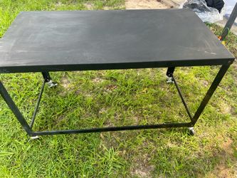 Metal table with wheels