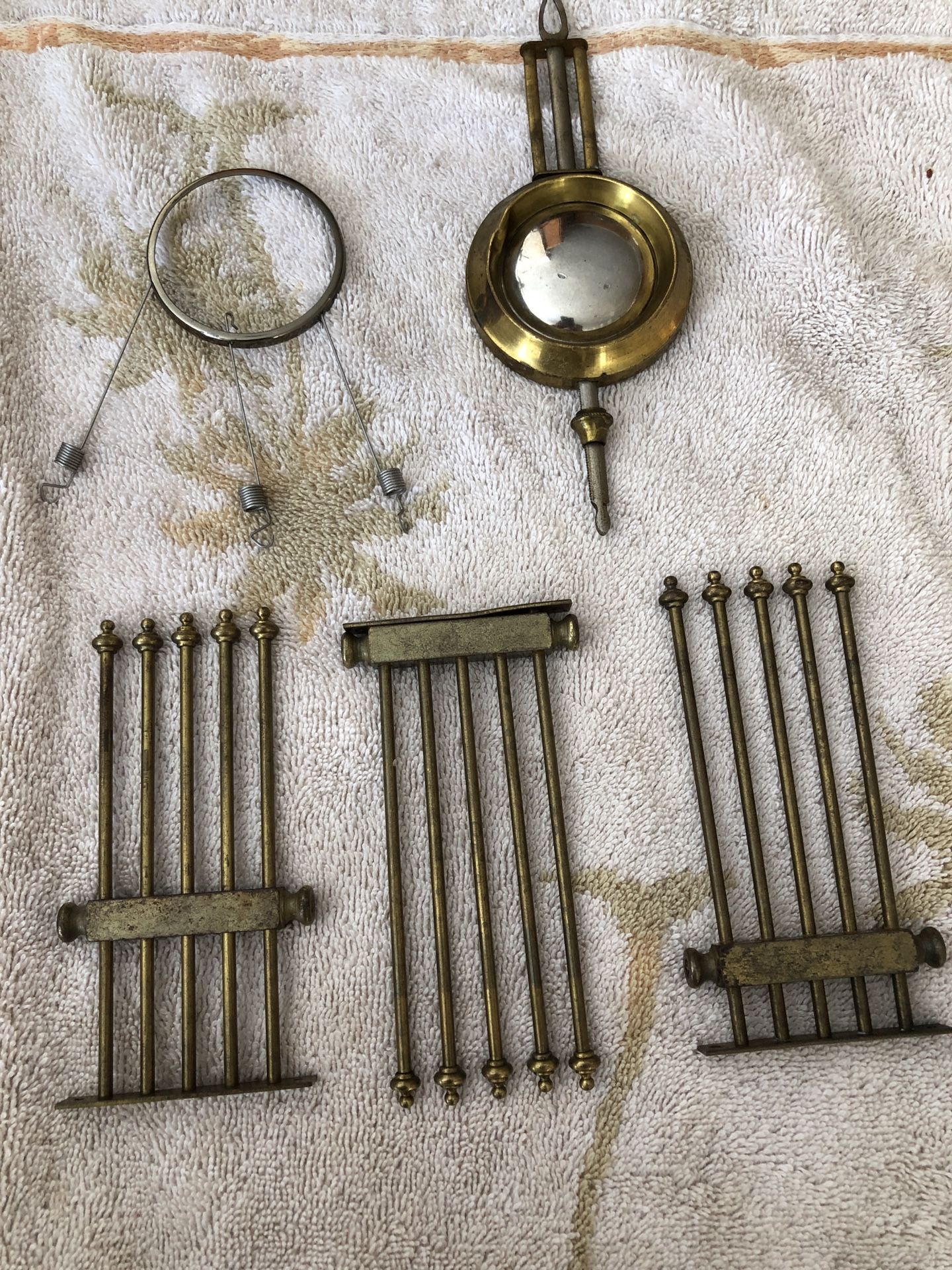 Antique clock parts, brass