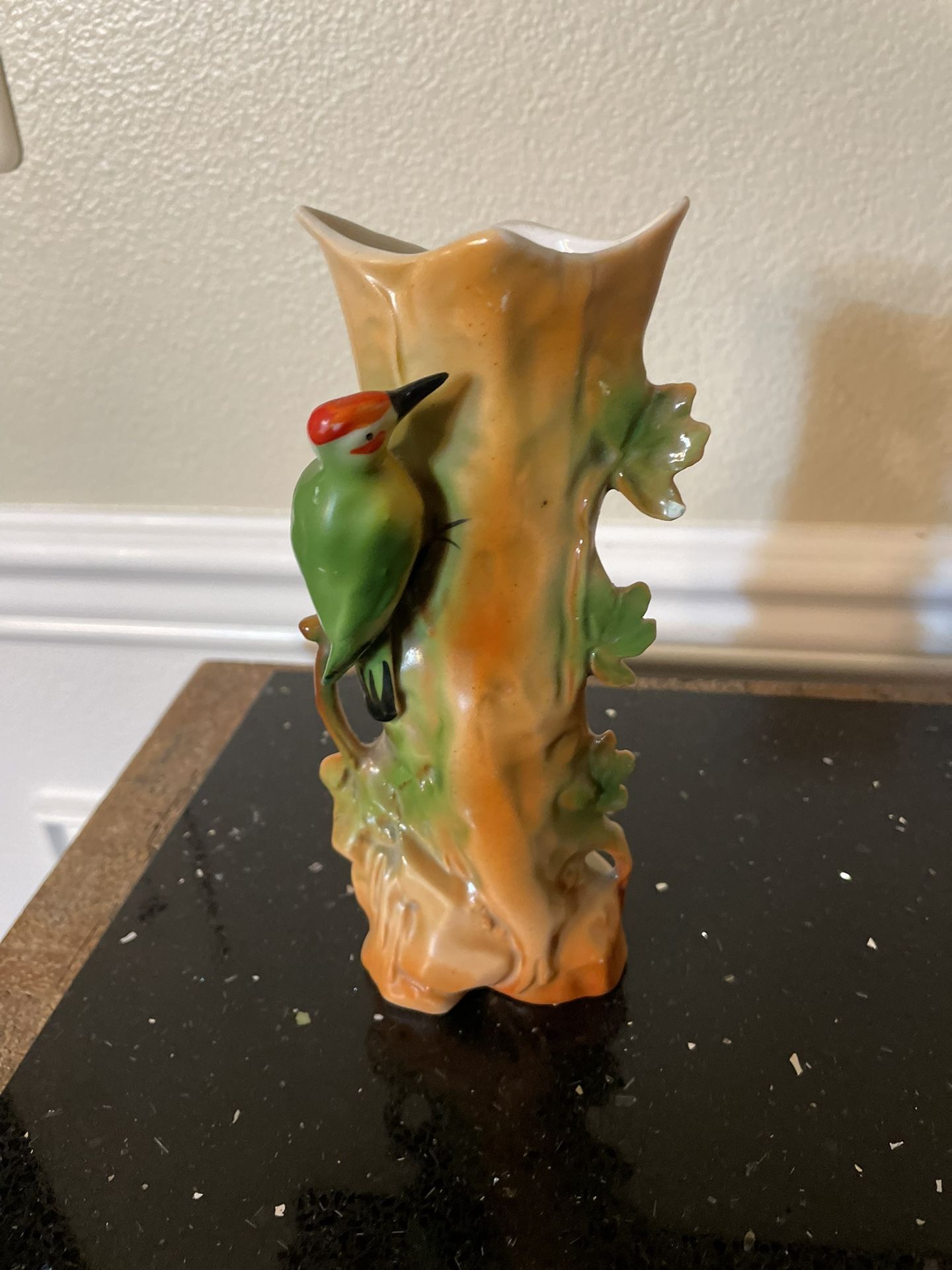 Vintage Porcelain Figurine of a Woodpecker on a Trunk 7”. Made in German