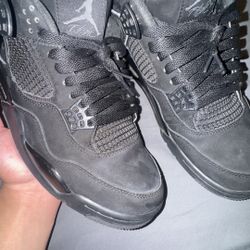 Black cat jordan 4s 