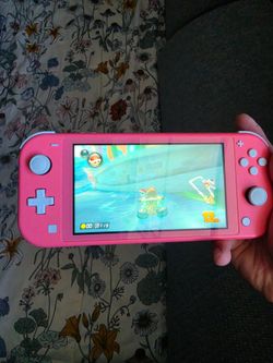 NINTENDO SWITCH LITE + MK8 130$ FIRME