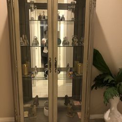 Gray Cabinet With Glass Shelves