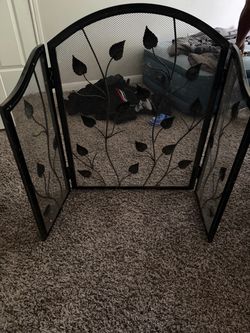 Black fire place guard with floral