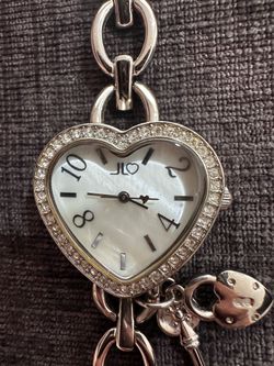 JENNIFER LOPEZ SILVER HEART-SHAPED WATCH WOMENS