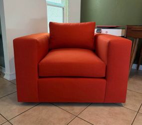 Oceanside Blood Orange Swivel Armchair by Crate&Barrel