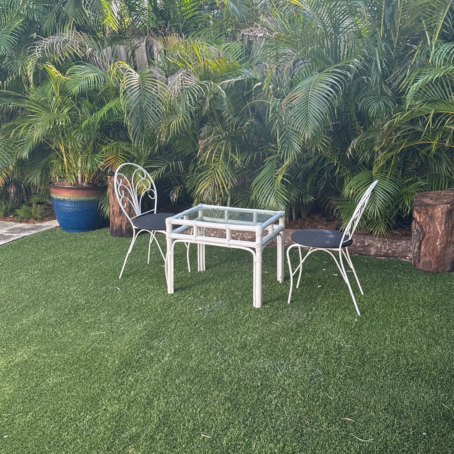 Small Glass And Rattan Table With Chairs