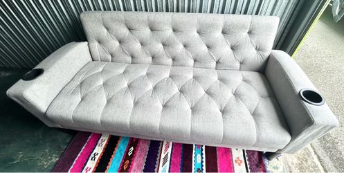 Gray Tufted Futon Sofa with Cup Holders