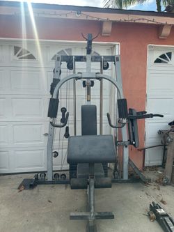 Multi station gym weight machine