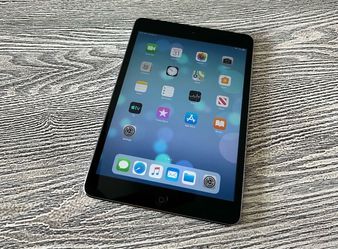 Apple iPad Mini 2 in excellent condition, complete with charge cord- Unlocked- Low Price.  $25