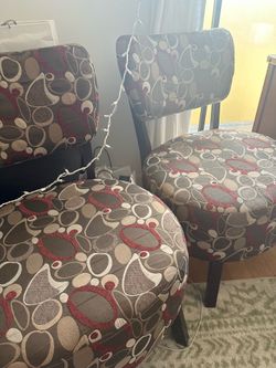 Two Matching Pattern Living Chairs