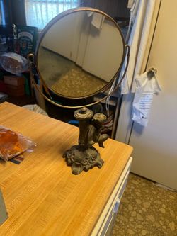 Vintage cast-iron cherub French double-sided mirror