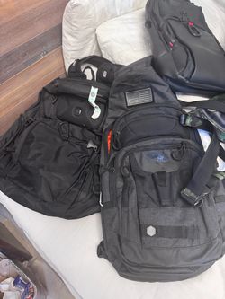 TUMI and other Backpacks