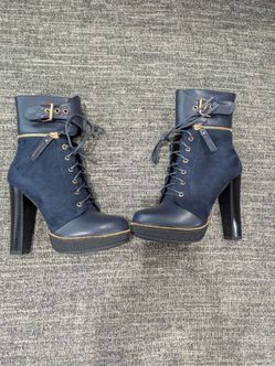 Navy blue and gold high heel boots