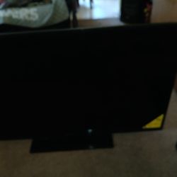 55 inch TV with remote $60