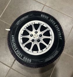 Tire-Shaped Ottoman Pillow