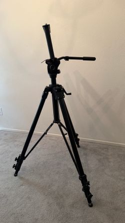 Manfrotto 161MK2B heavy duty tripod.