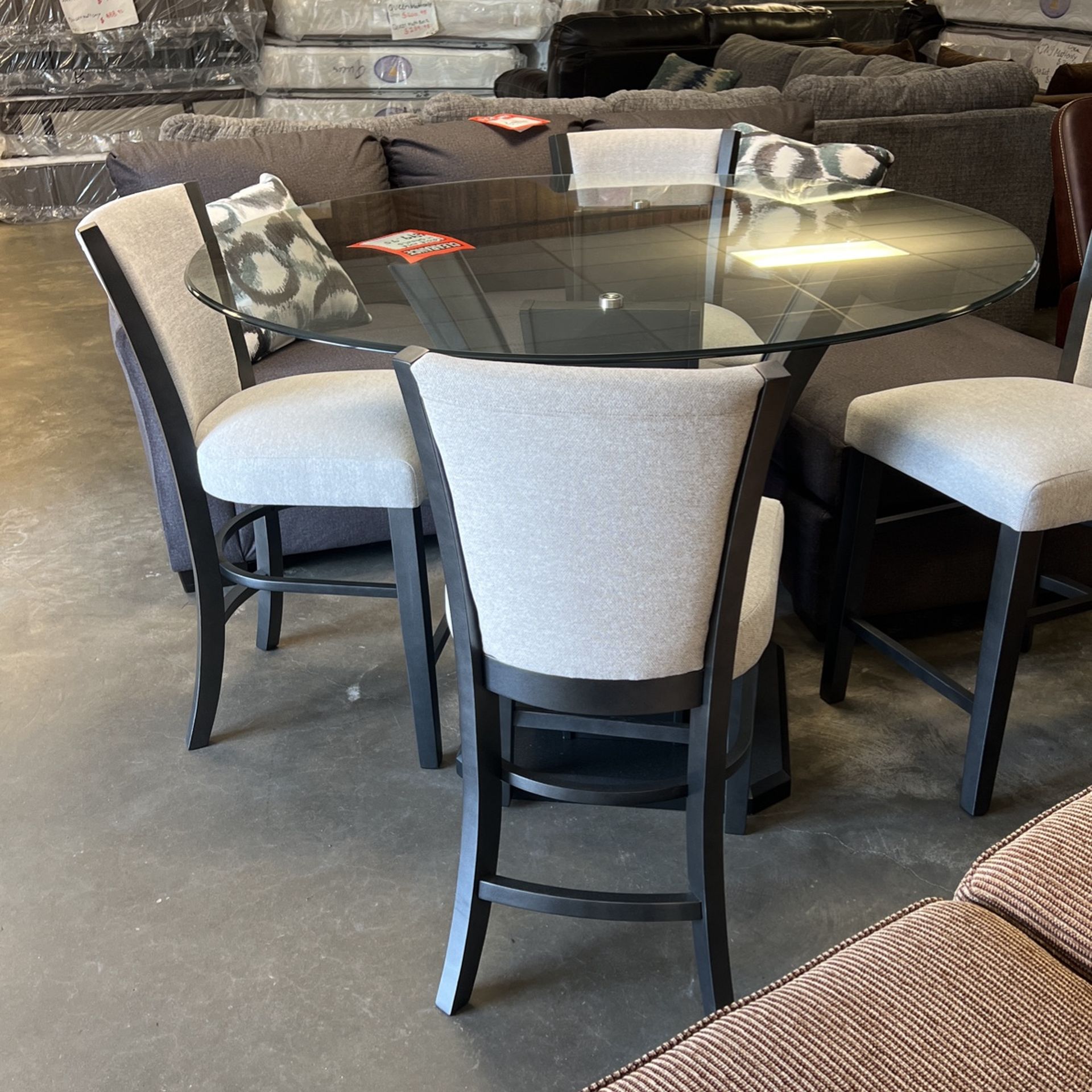 36 inch high table and four stools for 699 brand new