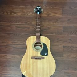 Used Acoustic Epiphone Pro-1 NA Guitar, comes with used pack of strings only missing the thinnest string. Open to trades for electric guitars.