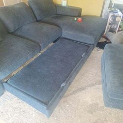 sectional couch with ottoman and pull out bed