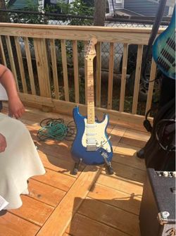 Blue Electric Guitar Stratocaster fender and amp