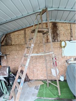 8 foot wood letter, 3 foot stand on top
