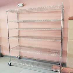 4 Large wire racks on wheels