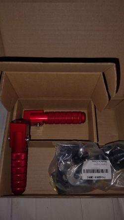 Red motorcycle foot pegs