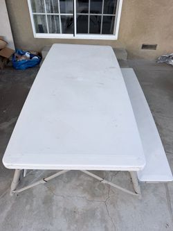 Foldable party table with bench.