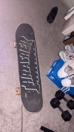 Size 8 caballero board with independent trucks  bones wheels nd bearings and thrasher grip tape