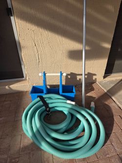 Pool pole tote and vac hose.