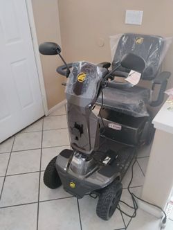 Golden company scooter and Harmar Lift