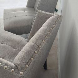 2 vonitos armchairs in good condition, light gray color with platinum buttons $65 each