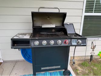 BBQ Grill with propane tank with some propane