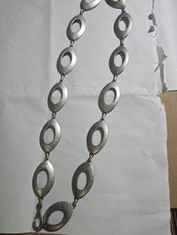 Silver toned belt/necklace