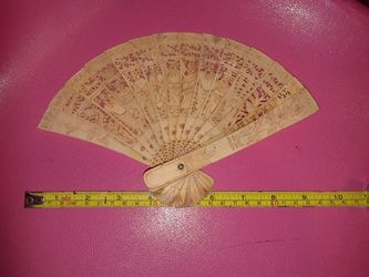 Antique China carved bone fan.