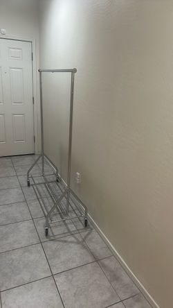 Chrome Rolling Clothes Rack with Bottom Shelf
