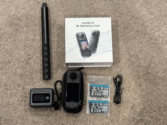 Insta360 X5 360 camera w/ dual battery , quick charger, and invisible stick.