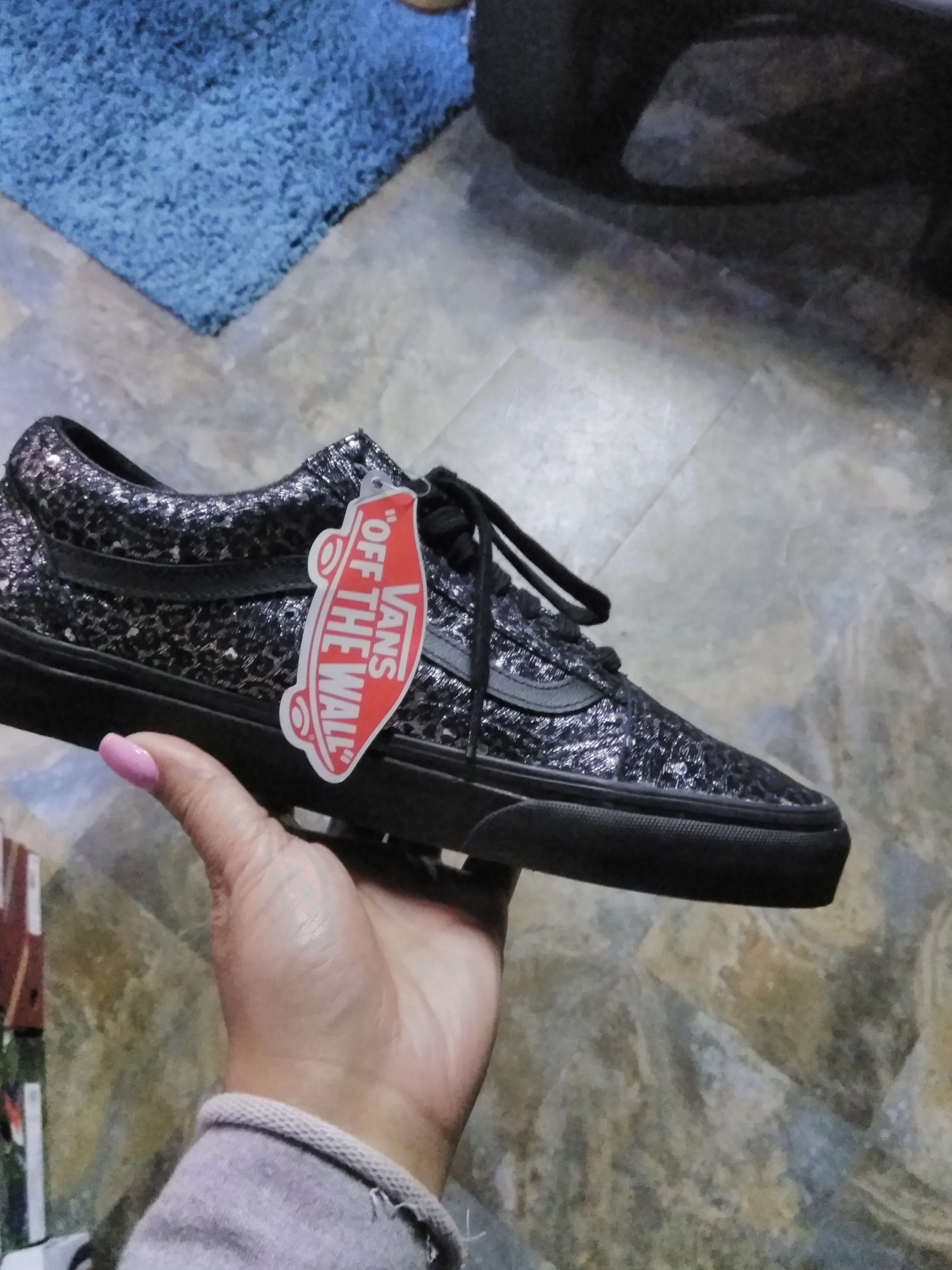 Vans all black and silver specs