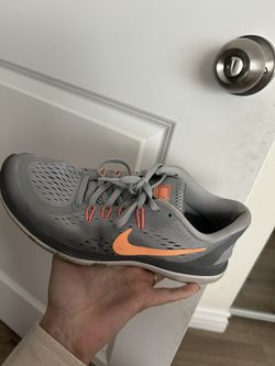 Grey/orange nike shoes - used