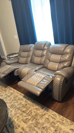 living room set. Leather couch, coffee table,