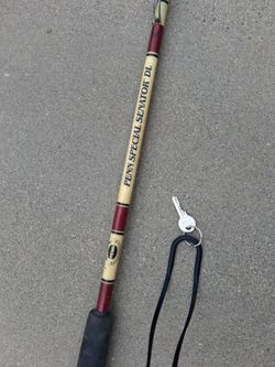 Old fishing poles and reels