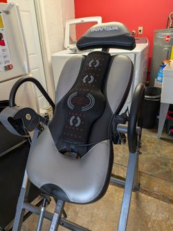Back extension machine with heat & masage