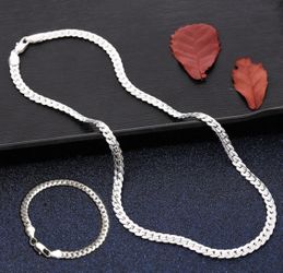 New 18 k white gold necklace and bracelet set