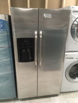 STAINLESS STEEL REFRIGERATOR SIDE BY SIDE NEW scratch and dent UNIT