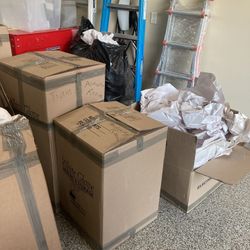 A Set Of Artwork And Médium And Large Moving Boxes Ans