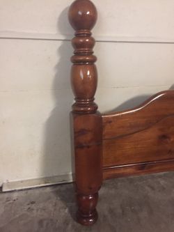 Wooden foot board of king bed