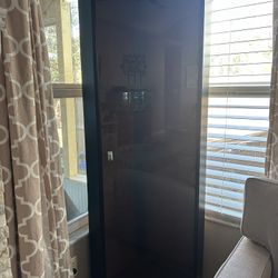 Howard Miller Corner Curio Cabinet