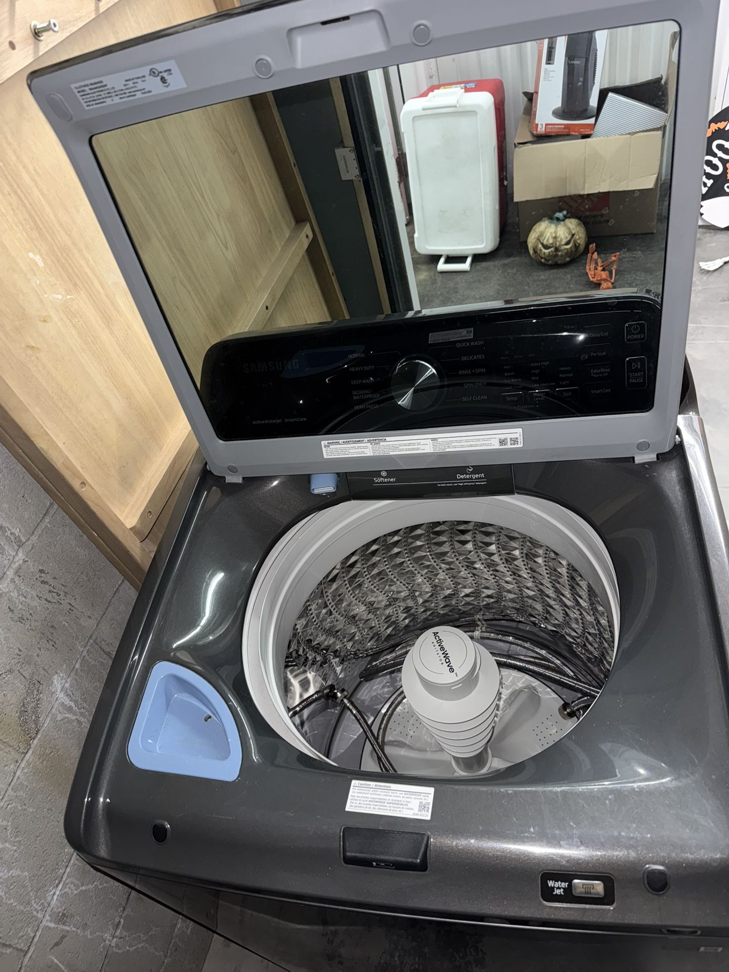 Samsung 4.4 cu. ft.  Top Load Washer And 7.4 Cu. Ft Front Load  Dryer 
