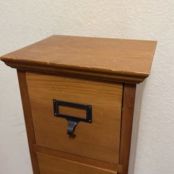 Tower with small storage drawers made for CDs